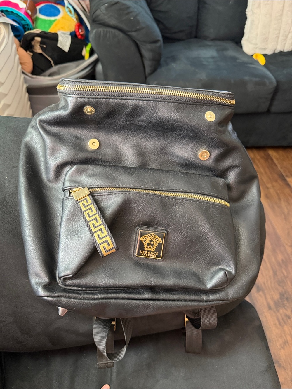 Versace Black Leather Backpack with Gold Hardware and Medusa Patch